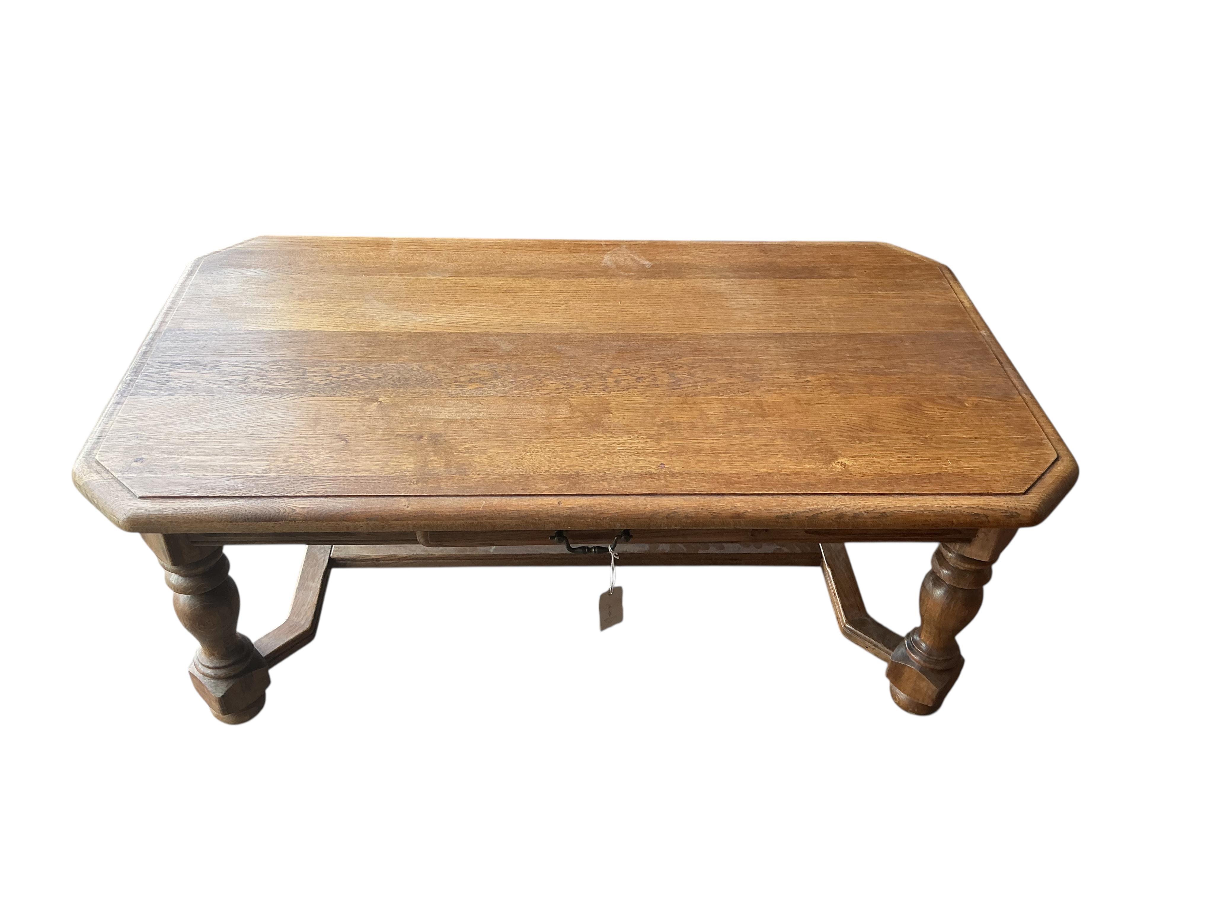 A rectangular oak coffee table, width 120cm, depth 70cm, height 47cm
